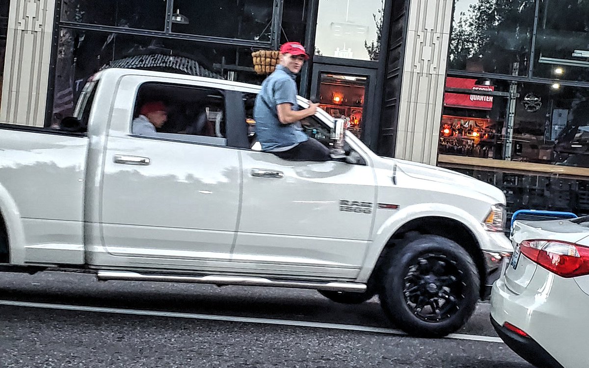 This passenger almost falling out of the truck after a sudden stop is a moment I wish I'd captured.