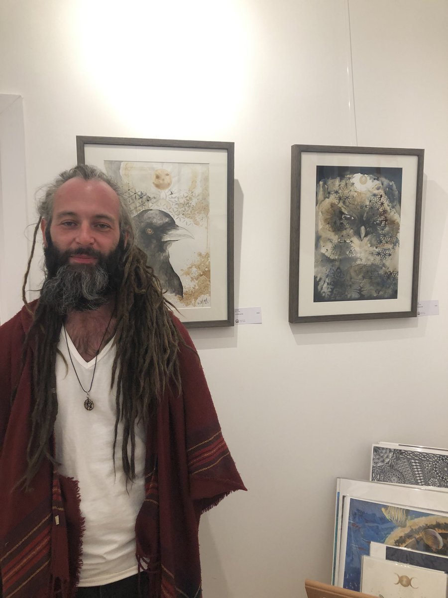 HeartofTheTrib3's tweet photo. One of our Core Artists Wil I Om and Gallery Manager Kim Von Coels with their work #glastonbury #heartofthetribe https://t.co/h6HUvkyv4e