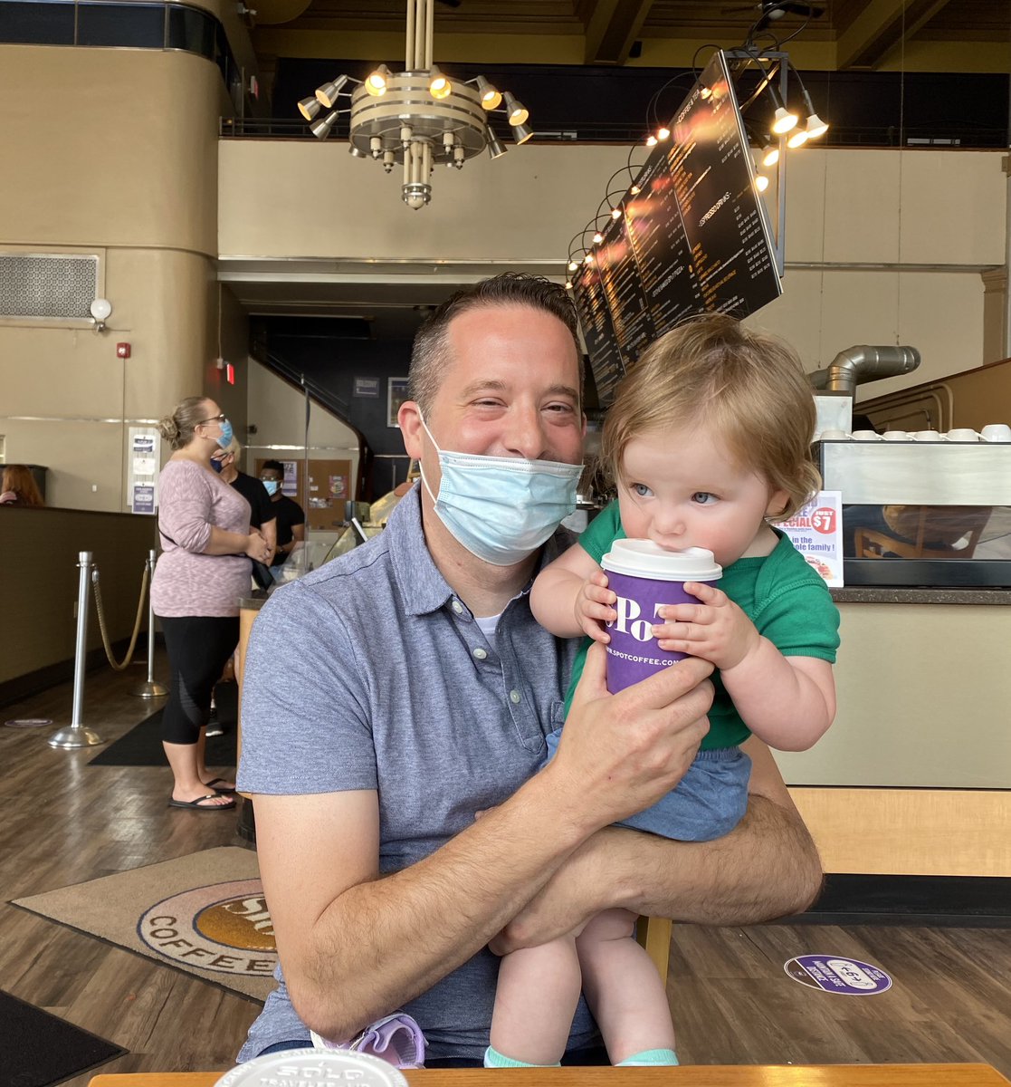BarryforNY56's tweet photo. That moment when your 1 year old makes you laugh so hard that your mask falls off while trying to steal a sip of your coffee.￼ Good thing we were sitting😉 https://t.co/lNqA9GNA5w