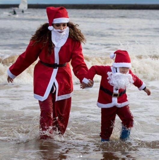 jade takes part in the Boxing Day dip in South Shields every year where people run into the freezing cold North Sea to raise money for cancer connections.