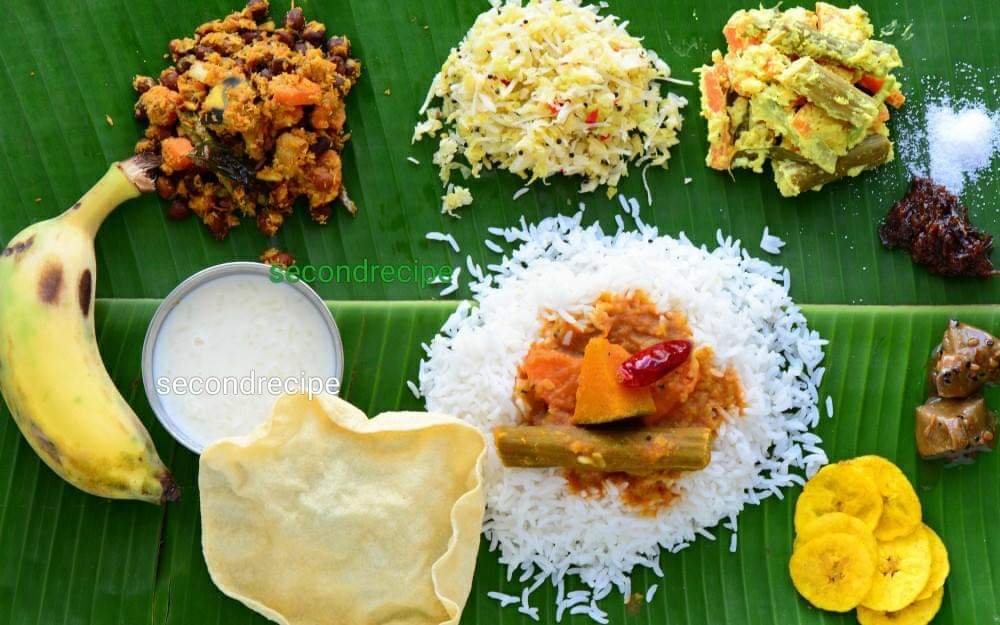 secondrecipe's tweet photo. #HappyOnam  #HappyOnam2020 #Kerala #sadhya #veg #veggies #banana #leaf #festive 
Onam Sadhya
Dishes served on banana leaf- banana, kadala curry,cabbage thoran,avial,salt,pullenji chutney,rice,sambhar,banana chips,payasam kheer, salt and appalam
Recipe: https://t.co/BQ6ZuV1XGI https://t.co/a8mtmAMVaO