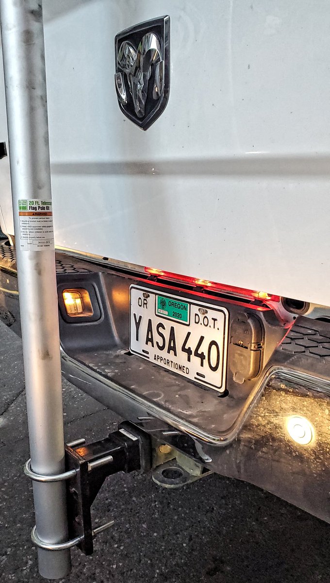 This Dodge truck had government plates. One of the few in the procession with plates clearly visible. Please ID them.