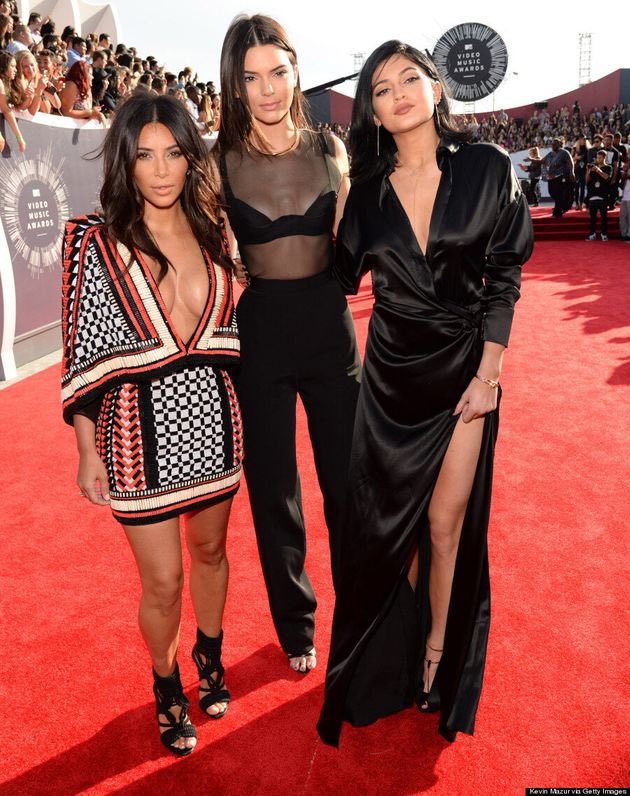 2014: Kim attended the  #VMAs   sans Kanye, but instead with Kendall and Kylie.She presented Sam Smith’s performance at the award show.Kanye was also nominated for Hip-Hop Video for “Black Skinhead.”