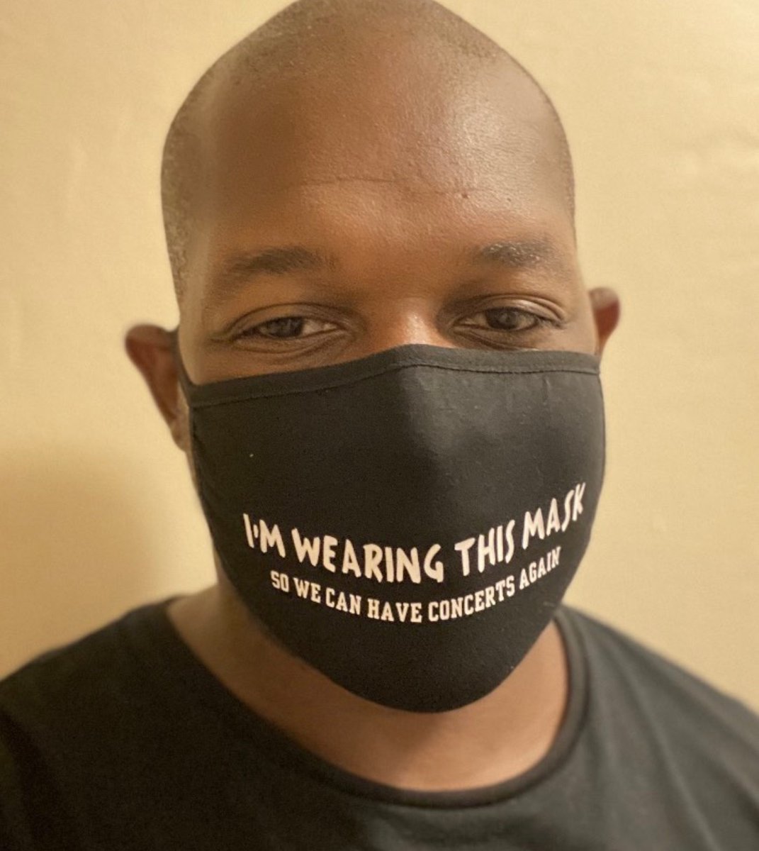 SLessard's tweet photo. I’m optimistic but a realist. Let's beat this pandemic, so 2021 summer tour is not messed with in any way.  This is also why I support masks in public. DJ Logic’s mask says it all. Let's create the reality of an optimistic tomorrow by wearing your mask and caring for others today https://t.co/uq3Rr9KWsb
