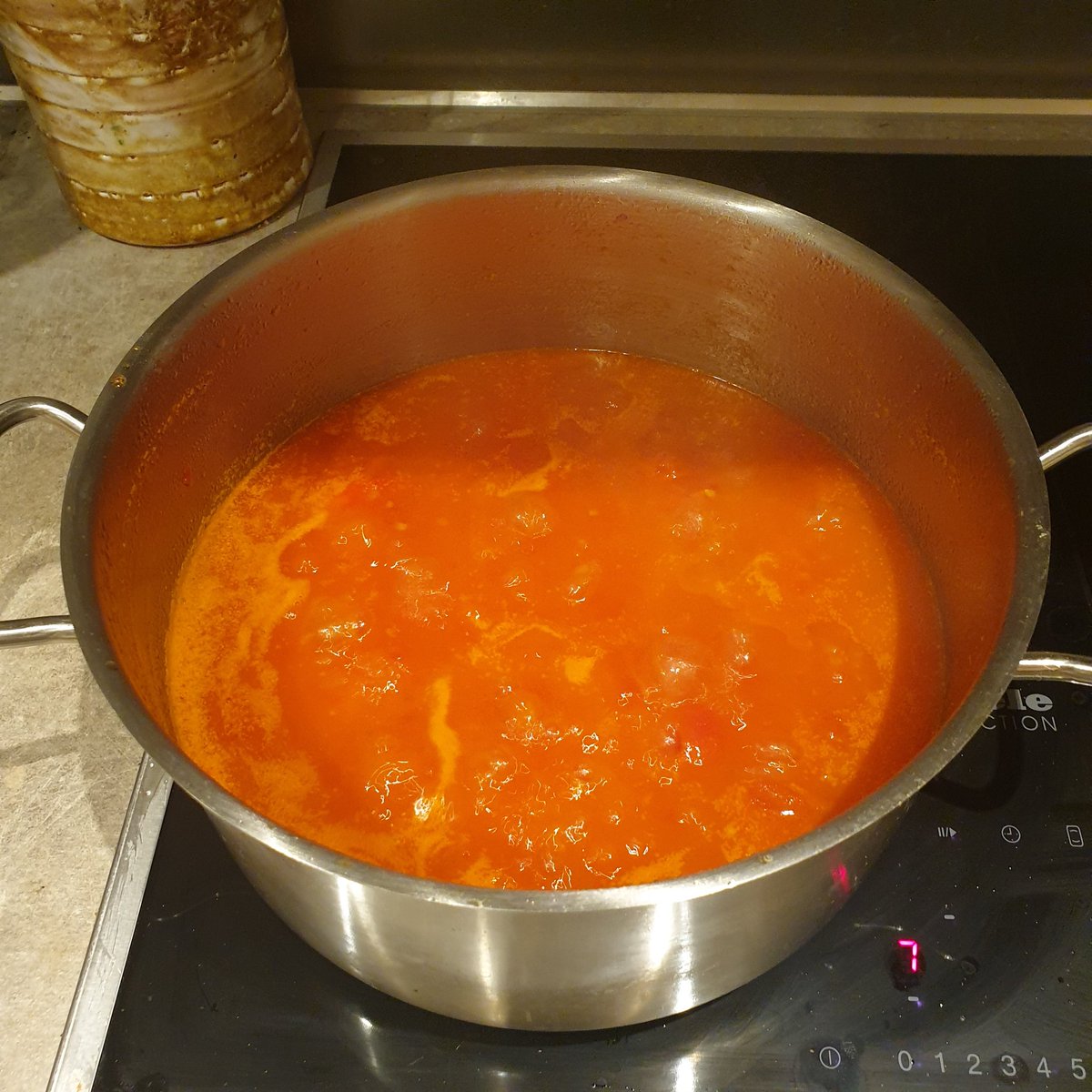 much more regular liquid now but a long way to go. tomato flavour should be starting to make its presence felt now. remember to stir. also scrape any residue that forms on sides of pan during reduction back into mix. big flavour