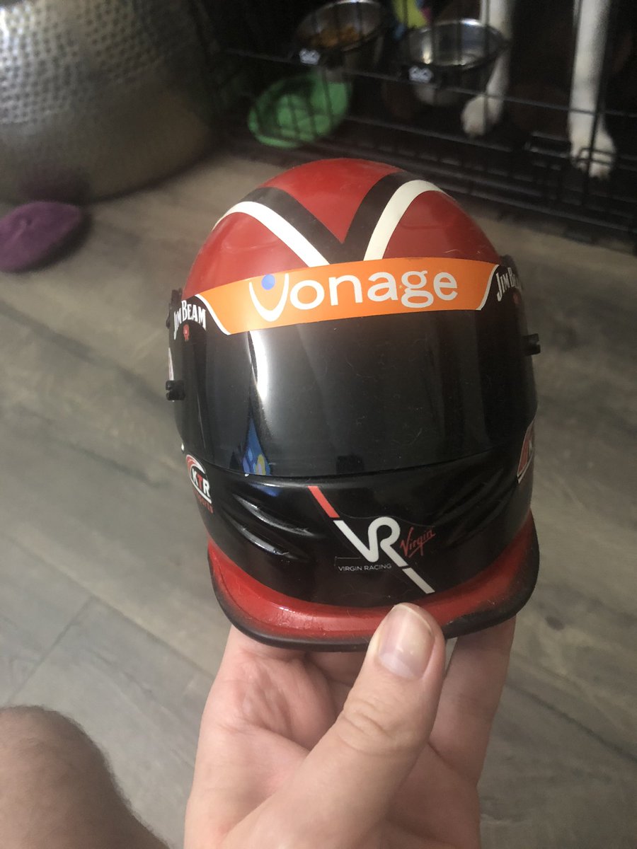 I have a couple helmets made too. This is my miniature one, which I assume started life as an Andretti IndyCar helmet.
