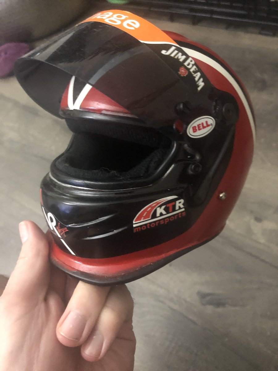 I have a couple helmets made too. This is my miniature one, which I assume started life as an Andretti IndyCar helmet.
