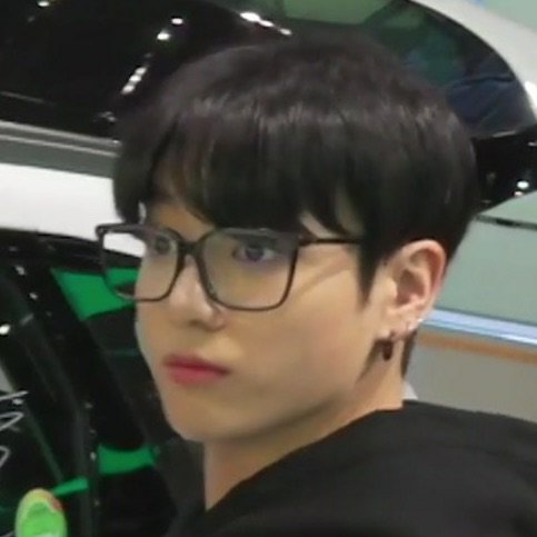 koo with specs and cute shirt hair