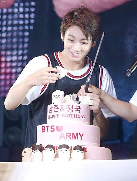 jungkook with cakes but as you scroll down he gets older—a thread #JungkookDay  @BTS_twt