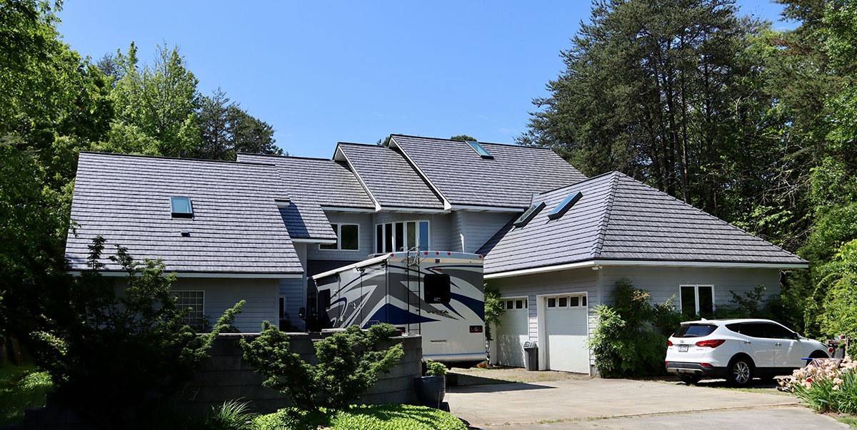 Check out the beautiful update McCarthy Metal Roofing completed on the Hodge + Peterson's roof earlier this year! We love how the Slate Rock Gray Oxford Shingle makes their beautiful home truly shine.

#metalroof #homeimprovement #NorthCarolina