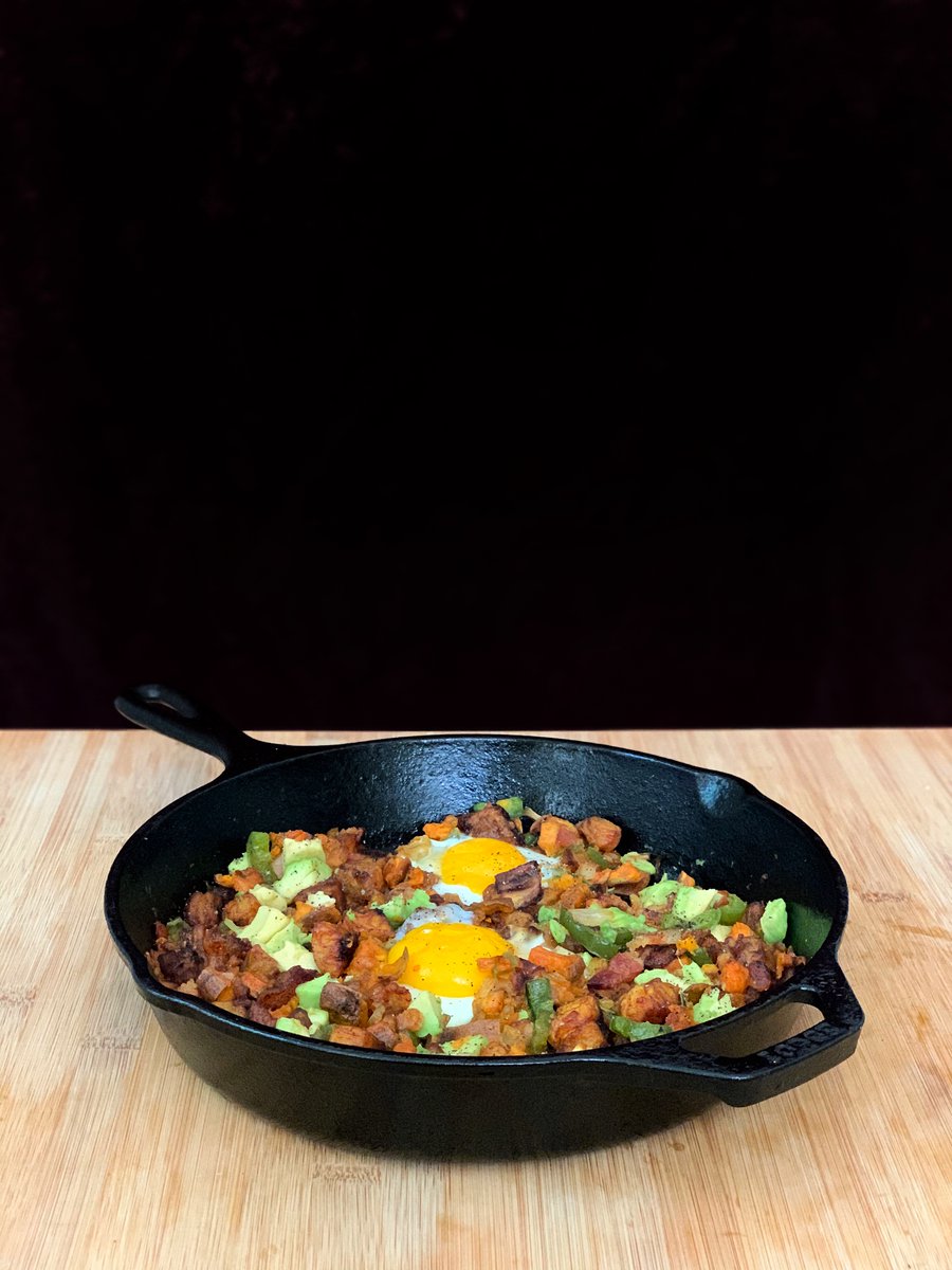 an absolute kitchen sink of a breakfast hash because i'm v. deep into the feeling that life is just an endless cycle of buying food that you have to cook? plantain,sweet potato, jalapeños, onion, garlic,  @savenors double smoked bacon, avocado, eggs  #humblebragdiet