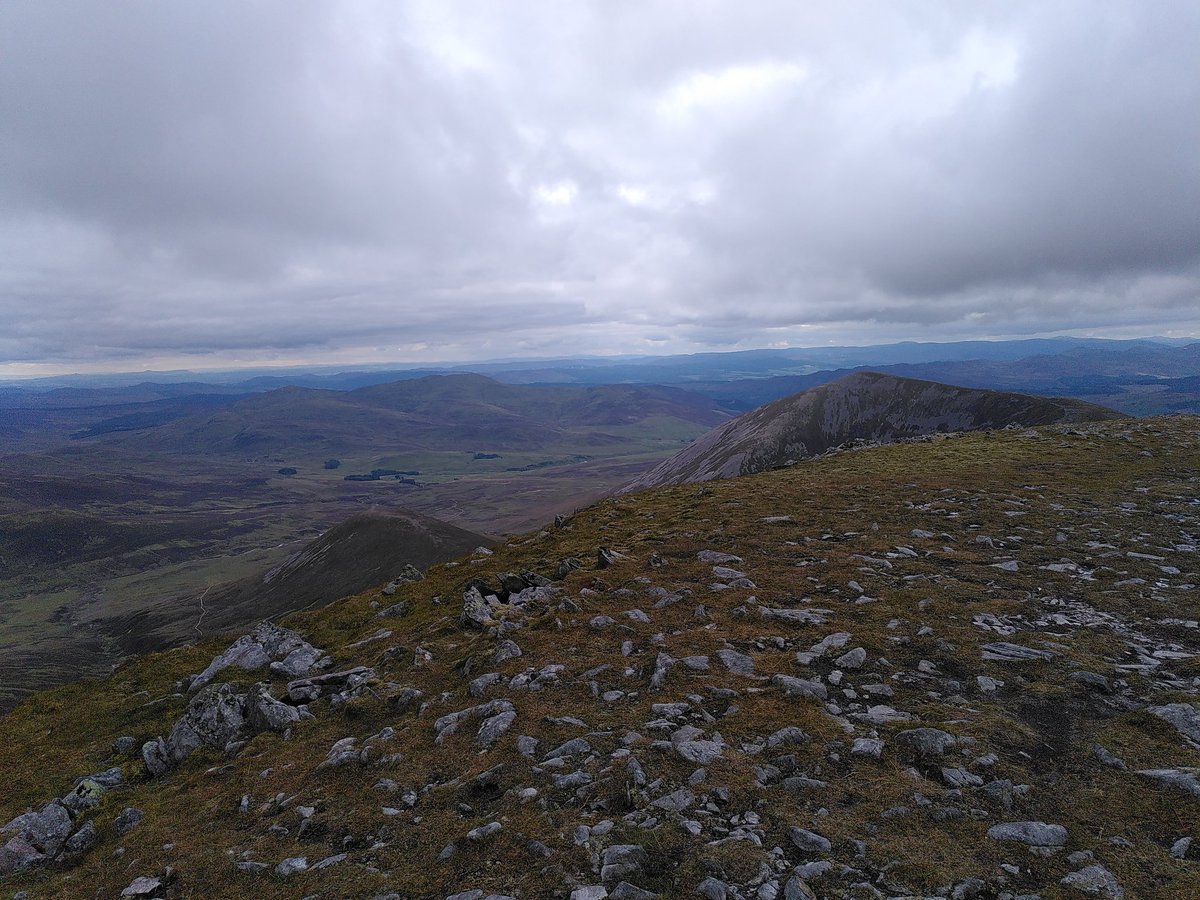 Answer now in the replies to that first tweet. Well done to  @andywightman, who wins nae prize. For anyone who remains interested, here are some photos from the second Munro summit of the day (there was no trig point on this one).