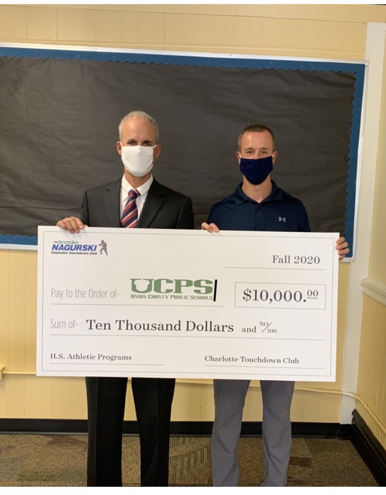 A huge thank you to ⁦<a href="/CTouchdownClub/">CLT Touchdown Club</a>⁩ for visiting ⁦<a href="/UCPSNC/">Union County Public Schools</a>⁩ today to present this generous donation to our HS athletic departments. Despite the challenges of the past year these guys continue to step up in support of education based athletics . ⁦<a href="/AGHoulihan/">Andrew G. Houlihan</a>⁩