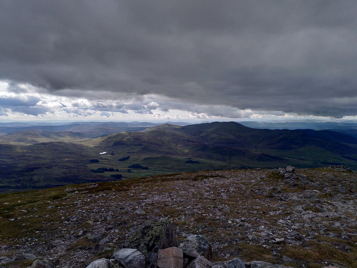 You join us for the latest edition of "name that hill". Here is the now orthodox photo from the four corners of the trig point atop the first Munro I bagged today. Nae prizes.