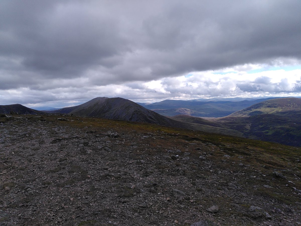 You join us for the latest edition of "name that hill". Here is the now orthodox photo from the four corners of the trig point atop the first Munro I bagged today. Nae prizes.