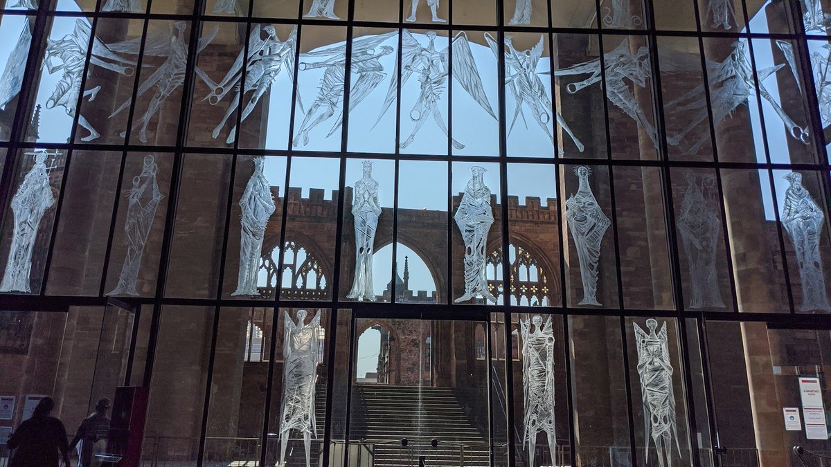 Inside the new cathedral, there is an emphasis on light.The Cathedral is turned, so that the West end looks out on the ruins of the old cathedral, and it's a great wall of glass, etched with dozens of angels.