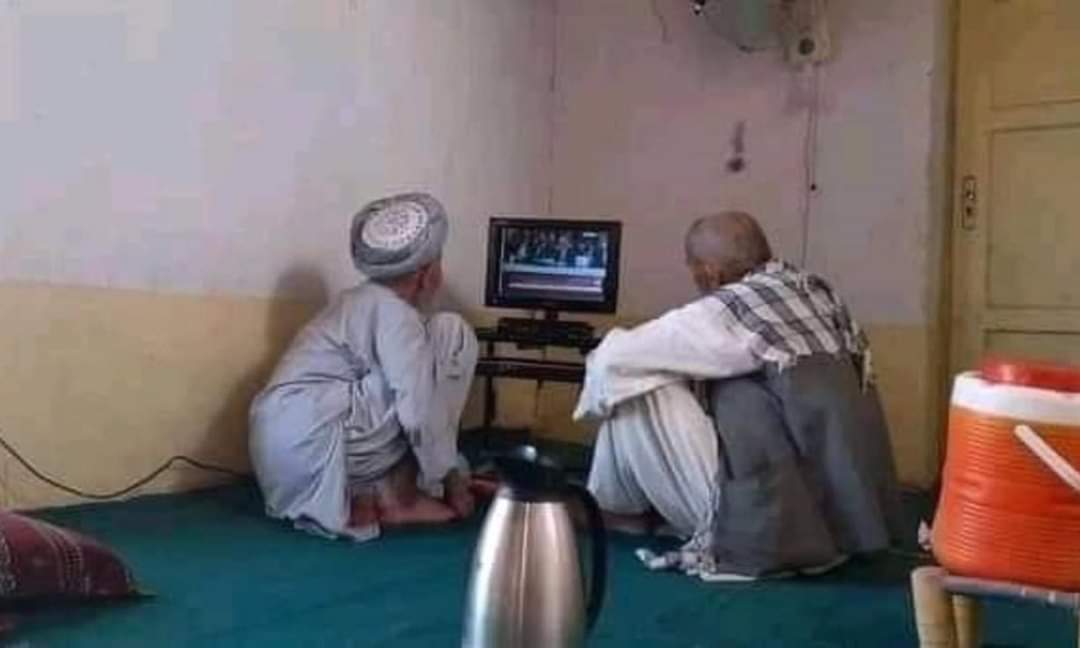 Somewhere in #Afghanistan. Two old men watching #IntraAfghanTalks, Longing for #Peace.
40 years of war that killed thousands of people,brought millions of widows, orphans. 
An entire generation turned old and ANOTHER grew-up in the shadow of war. May The #Peace prevail everywhere