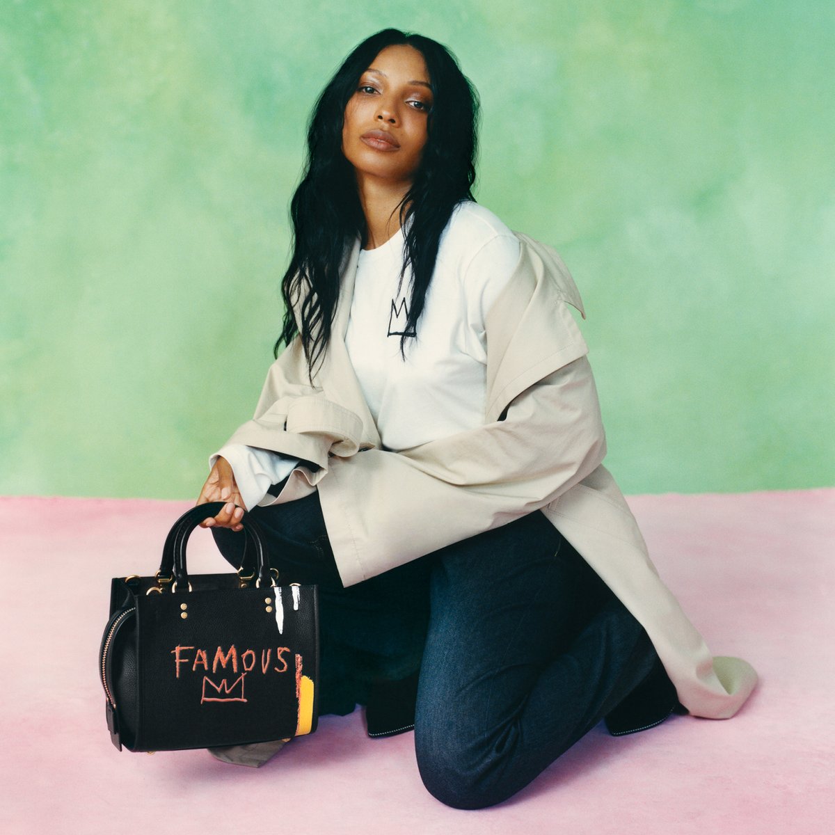 Coach's tweet photo. Queens only. #DianaGordon holds a #CoachxBasquiat Rogue bag embellished with the artist's iconic motif. https://t.co/Ss1wCQZUA4 #CoachNY https://t.co/4P9zu1MziL