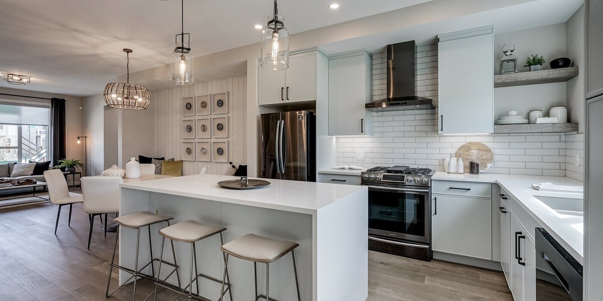 We love the look of subtle mint-green cabinets paired with white accents, and black stainless appliances. 

#wolfwillow #secalgary #yychomes #yycliving #townhomes #calgarykitchens #interiordesign #yycrealestate #showhome