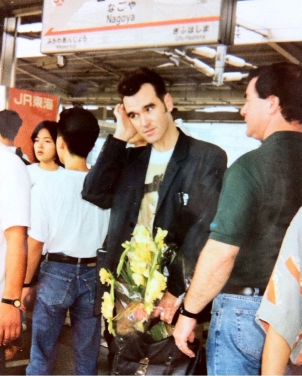 maladylingerson's tweet photo. pictures of morrissey looking very awkward around other people are some of my favourite things https://t.co/bqzgu2OJKG