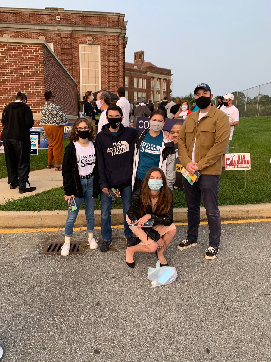 Jess and supporters greeting voters at the polls.