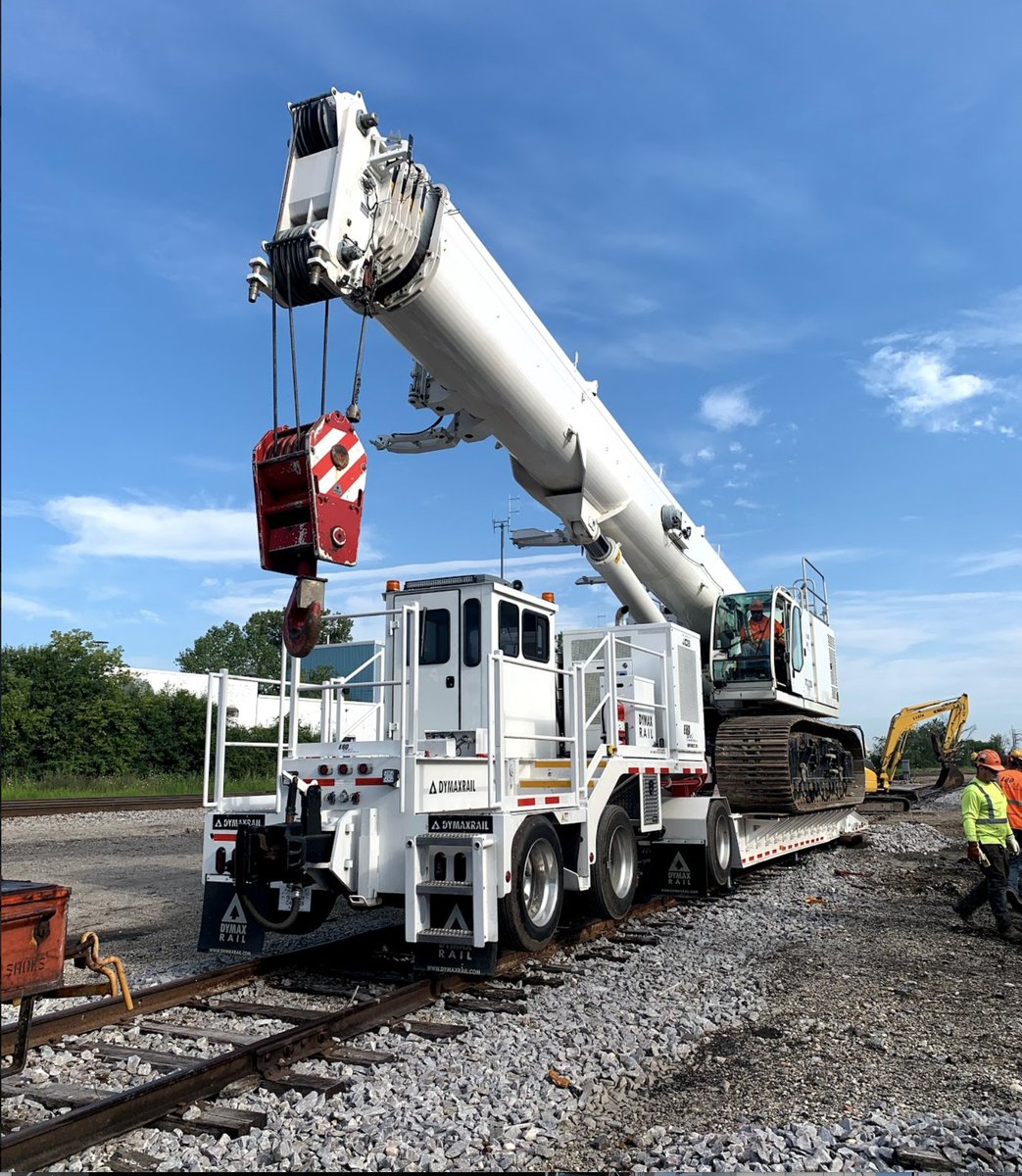 DymaxInc's tweet photo. We no more than finished putting on the logo decals when our customer took this LowBed 90T out to their worksite and put it to the test. That crane actually makes the unit look small. Hope they didn't scratch the paint. https://t.co/qX0nvLvT10
