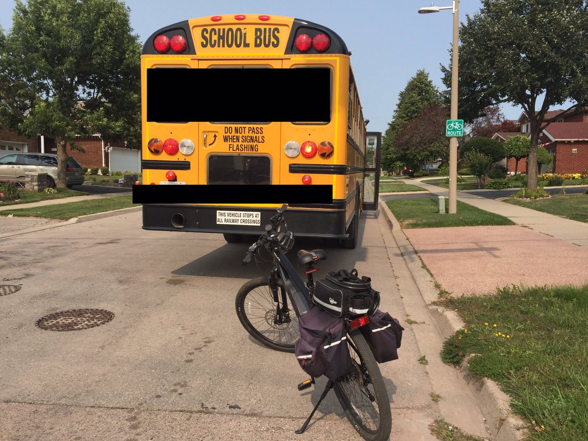HRPS_Comm's tweet image. #ProjectSafeStart: moments ago, our Traffic Unit stopped this school bus driver for #DistractedDriving (cellphone) at Trafalgar/Briarhall; in the active construction zone.

16 children on board.

The bus driver has been charged and the company has been notified through CVOR. ^MRT