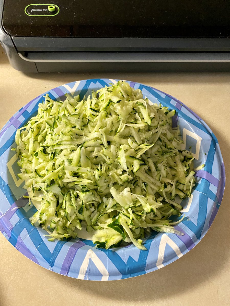 feralcatgang's tweet photo. Mom turned a plate of grated zucchini into zucchini, walnut and raisin muffins. https://t.co/a57J943MAu