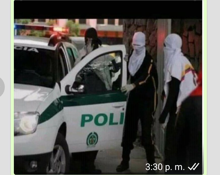 GaitanAlacarga's tweet photo. LA PARAPOLICIA URIBISTA, ENCAPUCHADA SALIENDO DE LA PATRULLA PARA INFILTRARSE EN LAS MARCHAS PARA HACER LOS DAÑOS PARA LUEGO CULPAR A LOS MANIFESTANTES. HAY QUE DENUNCIAR ESTO, SALIENDO A LAS CALLES A MANIFESTARSE https://t.co/hhQ9CtXnxM