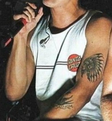 We are going to go on to his arms and specifically his left tattooed arm... and also... his swollness.