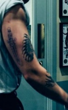 We are going to go on to his arms and specifically his left tattooed arm... and also... his swollness.