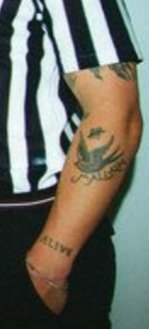 We are going to go on to his arms and specifically his left tattooed arm... and also... his swollness.