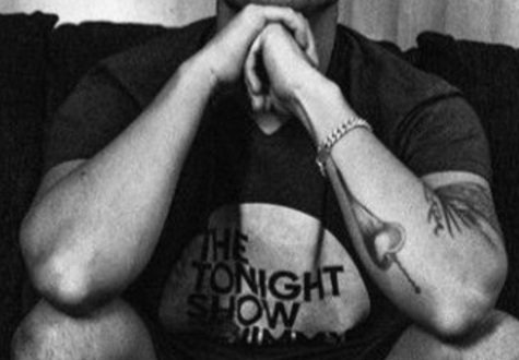 We are going to go on to his arms and specifically his left tattooed arm... and also... his swollness.