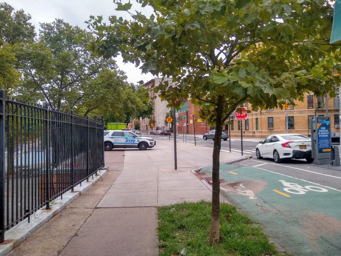 Mrele11's tweet photo. An @NYPDnews vehicle on the sidewalk as a show of intimidation, with a cop idling the car and playing on a cell phone. Meanwhile, there was trash everywhere, which is what happens with a decimated @NYCParks budget and bloated NYPD budget. @placardabuse
https://t.co/19mUfAwiLd https://t.co/irkppdo5pR