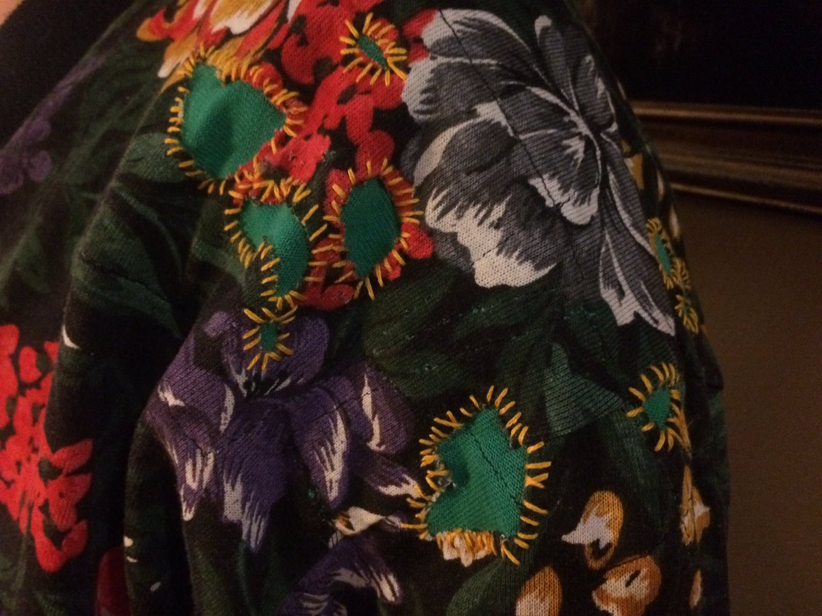 StoryBoyle's tweet photo. #VisualMending: roommate brought me his cardigan with tiny holes in the knit. Snipped away unstable fabric, under-patched, and whip-stitched the edges down. Am pleased! https://t.co/mNQMV7xfS8