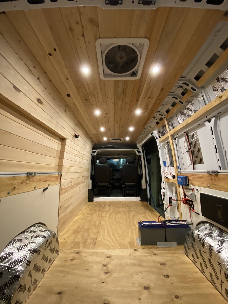 StevenMoore's tweet photo. I found a forest spirit in one of my ceiling boards... or it’s just a bark inclusion... I’m going with spirit. This is all the progress the rain would allow today. The ceiling is almost done and the fans have shrouds. #vanbuild #campervan #promastercampervan #campervanconversion https://t.co/tBPXAYd6Xp