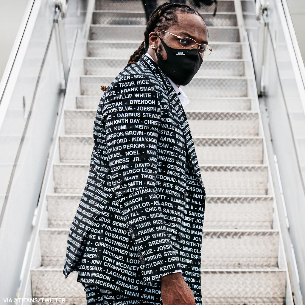 espn's tweet image. Derrick Henry sported a suit with names honoring victims of racial injustice.

(via @Titans)