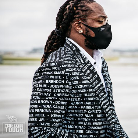 espn's tweet image. Derrick Henry sported a suit with names honoring victims of racial injustice.

(via @Titans)