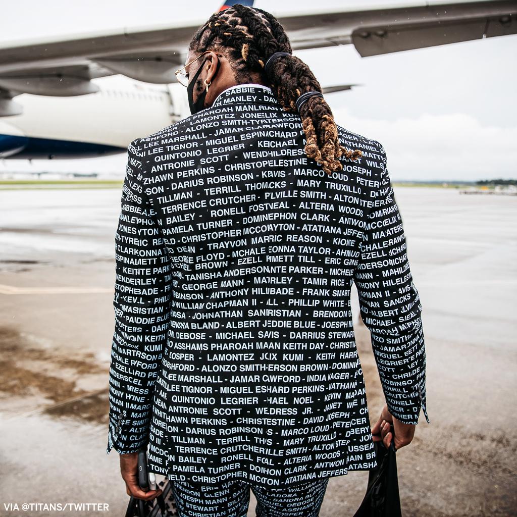espn's tweet image. Derrick Henry sported a suit with names honoring victims of racial injustice.

(via @Titans)