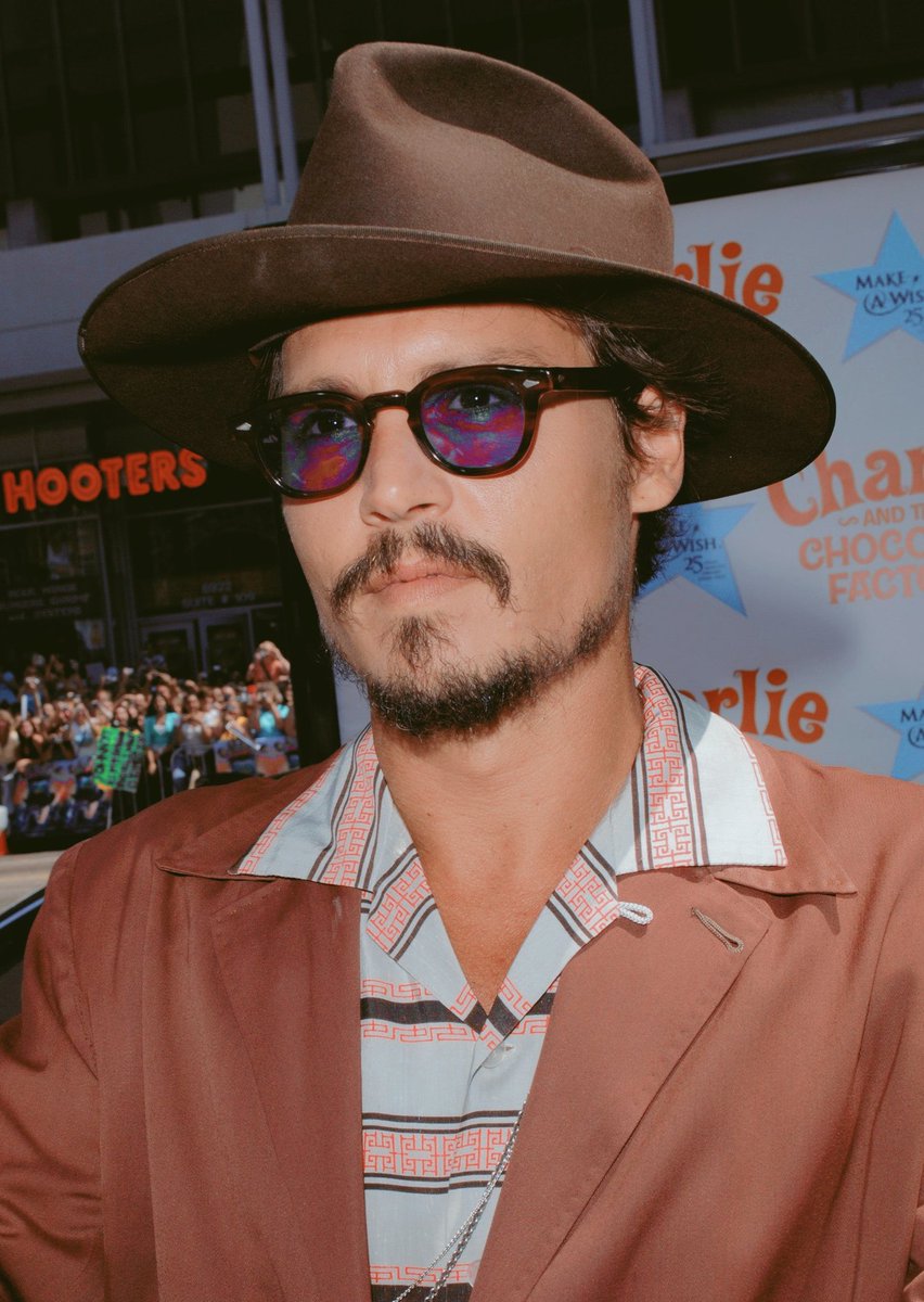 Johnny Depp as my extensive nail polish collection because it's a way for me to combine my two favourite things: a thread