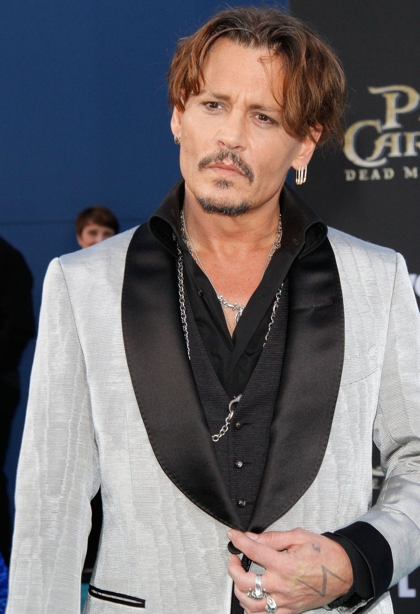 Johnny Depp as my extensive nail polish collection because it's a way for me to combine my two favourite things: a thread