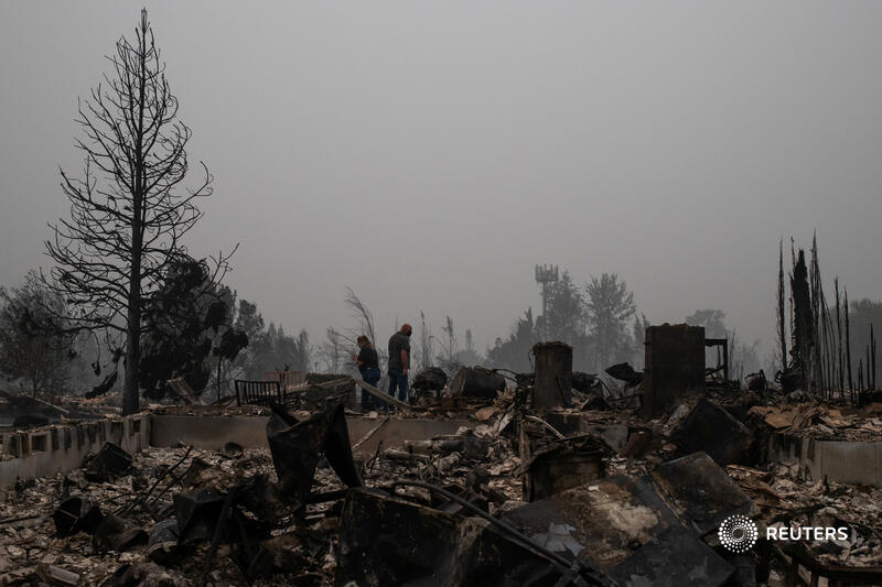 Reuters's tweet photo. 'All gone:' Residents return to burned-out Oregon towns as many West Coast wildfires keep burning https://t.co/NkclJ2Iggy https://t.co/NDQS3otnZM