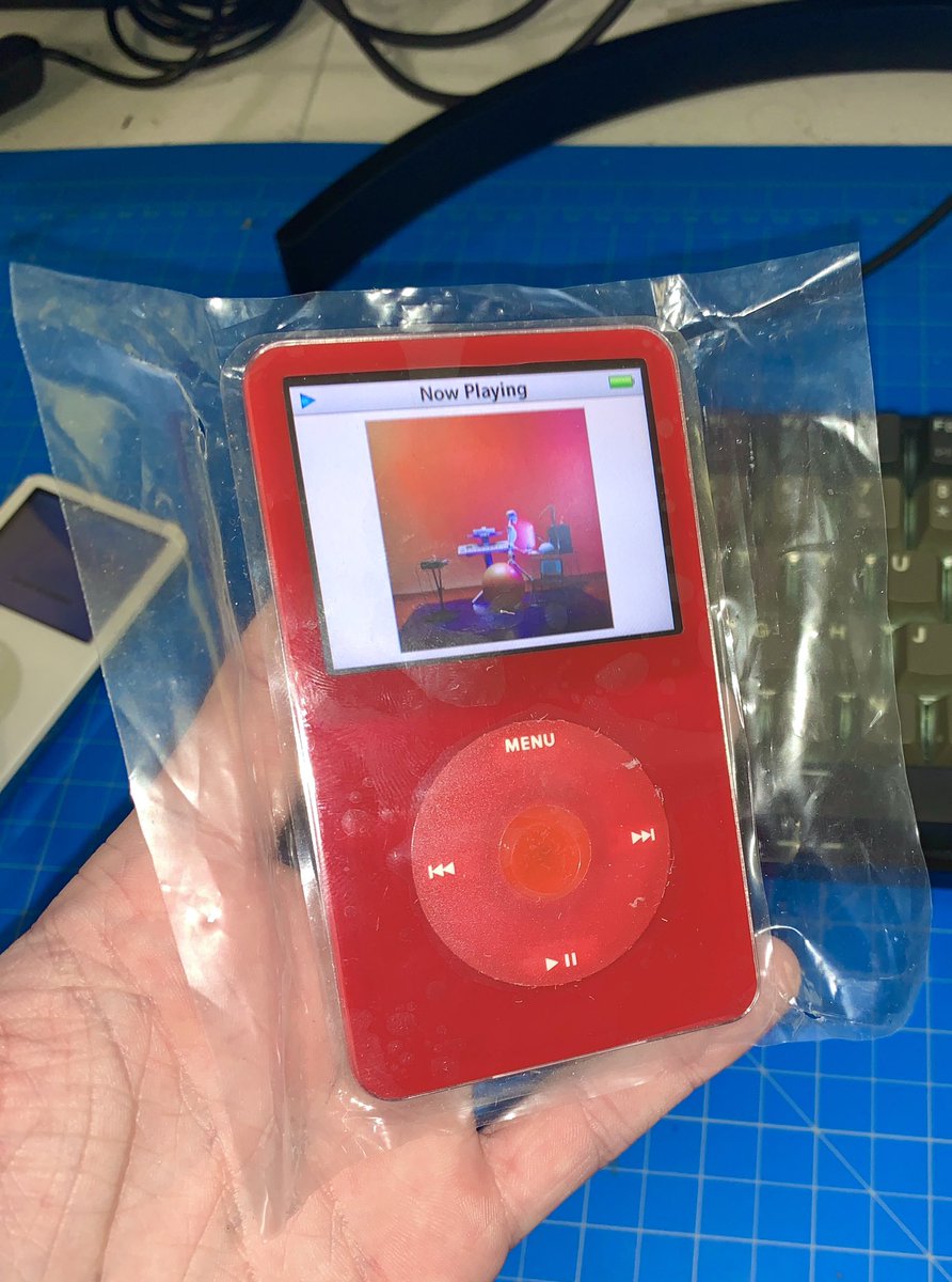 eliteobsolete's tweet photo. Brand new Red 5.5 128GB SDXC iFlash Solo with 2000mah battery installed in a thin model backplate #ipod #ipodvideo #ipodclassic #apple https://t.co/TchUDcbfE4