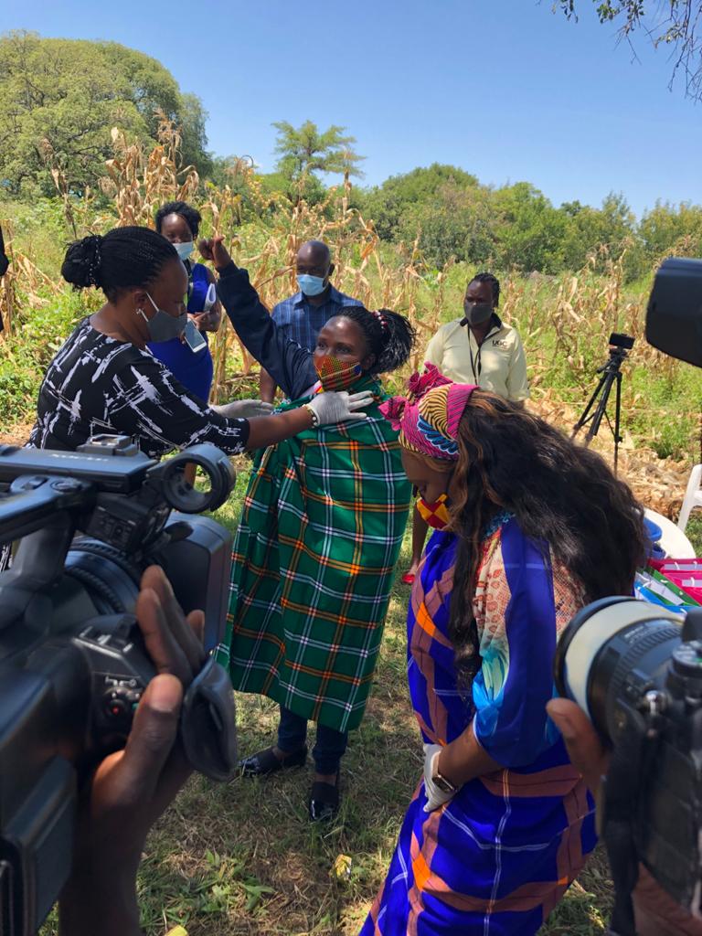 UNinUganda's tweet photo. Katikekile Youth Group members in Moroto welcome UN Resident Coordinator @RMalango2015 and #UNUgKaramojaMission The group showcased their work including tailoring & crafts #1MillionSDGSolutions https://t.co/M9MF2rYiym