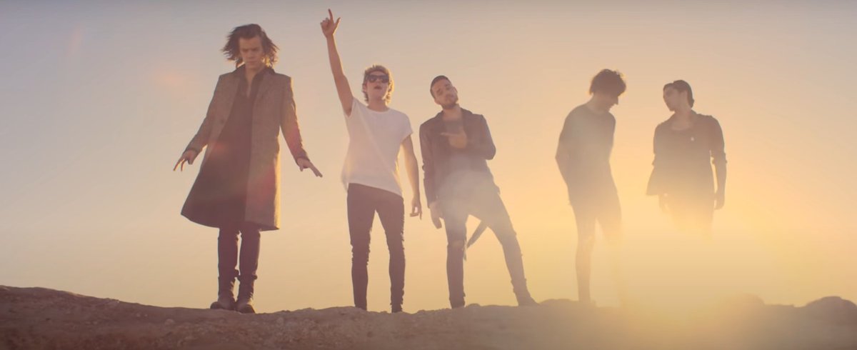 Everyone freaked out when they saw the scene with the five silhouettes. But it gets even creepier - there is a shot almost too similar to it in the SMG mv. They're backlit as well and even the order is almost the same! (Why did they make Niall and Harry change position though?)