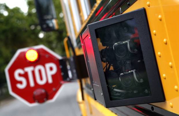 OttawaPolice's tweet photo. Fines for not obeying school bus signals range from $400 to $2,000 and six demerit points. Some buses are equipped with cameras to catch drivers who illegally pass when the lights are flashing and the stop arm is extended. #BackToSchool @SROttawa https://t.co/WcuxpzBuTw