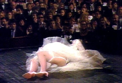 WornOnThisDay's tweet photo. Worn #onthisday in 1984 by @Madonna to sing "Like A Virgin" at the first ever @MTV @vmas, at @RadioCity Music Hall in New York, NY. She later told @jayleno: “I lost my . . . white stiletto. . . . As I reached for the shoe, the dress went up. And the underpants were showing." #OTD https://t.co/lPW5Lpp9wb