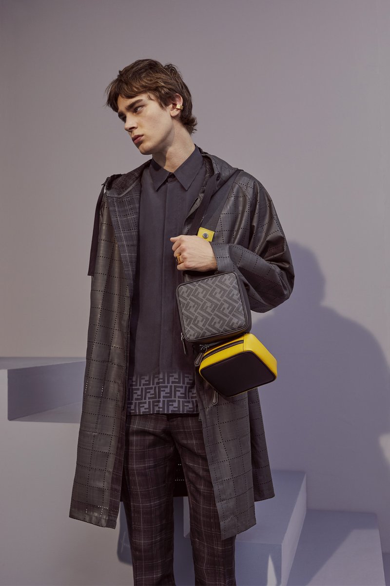 Fendi's tweet photo. Dependably functional designs that meet modern needs – the #FendiPreFall20 accessories update minimal, understated silhouettes with multi-use styling solutions for unrivaled versatility. #Fendi
Photographer: #JoshHight
Stylist: #JulianGanio
Models: #YangHao & #MitchellGorthy https://t.co/8t59lA6MR3