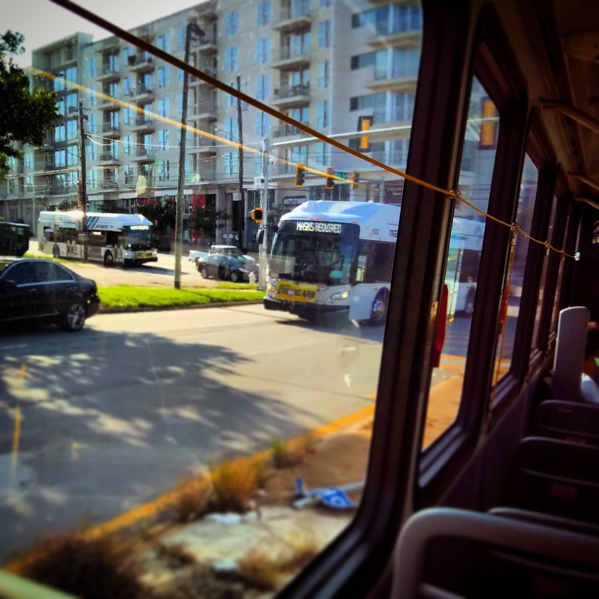 marta_explorers's tweet photo. Busy bus traffic on Memorial Drive seen from inside a Route 107 bus. The is where service overlaps with Route 21. #EssentialTransit https://t.co/iDtYiIvKdy