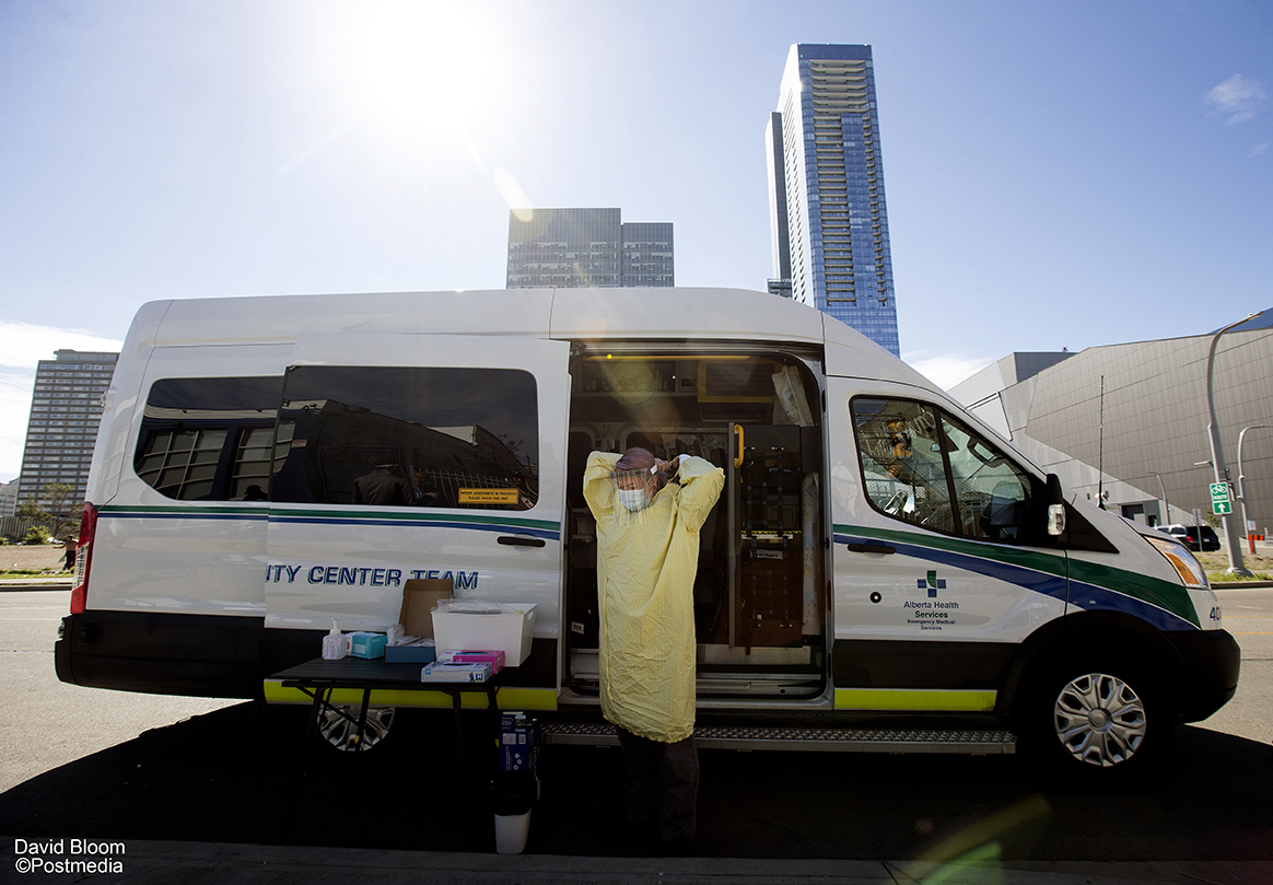 davidbloomphoto's tweet photo. On the frontline with EMS crews battling stress, fatigue and COVID-19 https://t.co/LftM38PrB0 #yeg #COVIDAB https://t.co/hnpC9trkqY